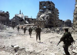 Assad-forces-in-homs aftert destruction